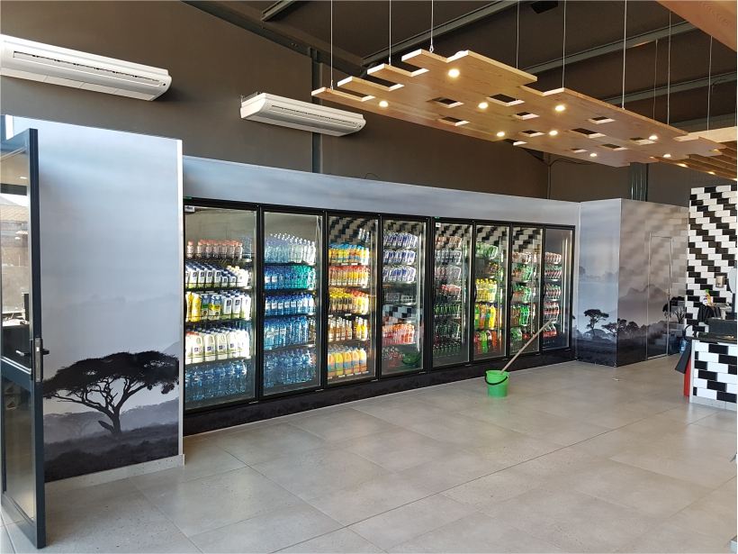 Custom branded interior fridge wraps for a retail store
